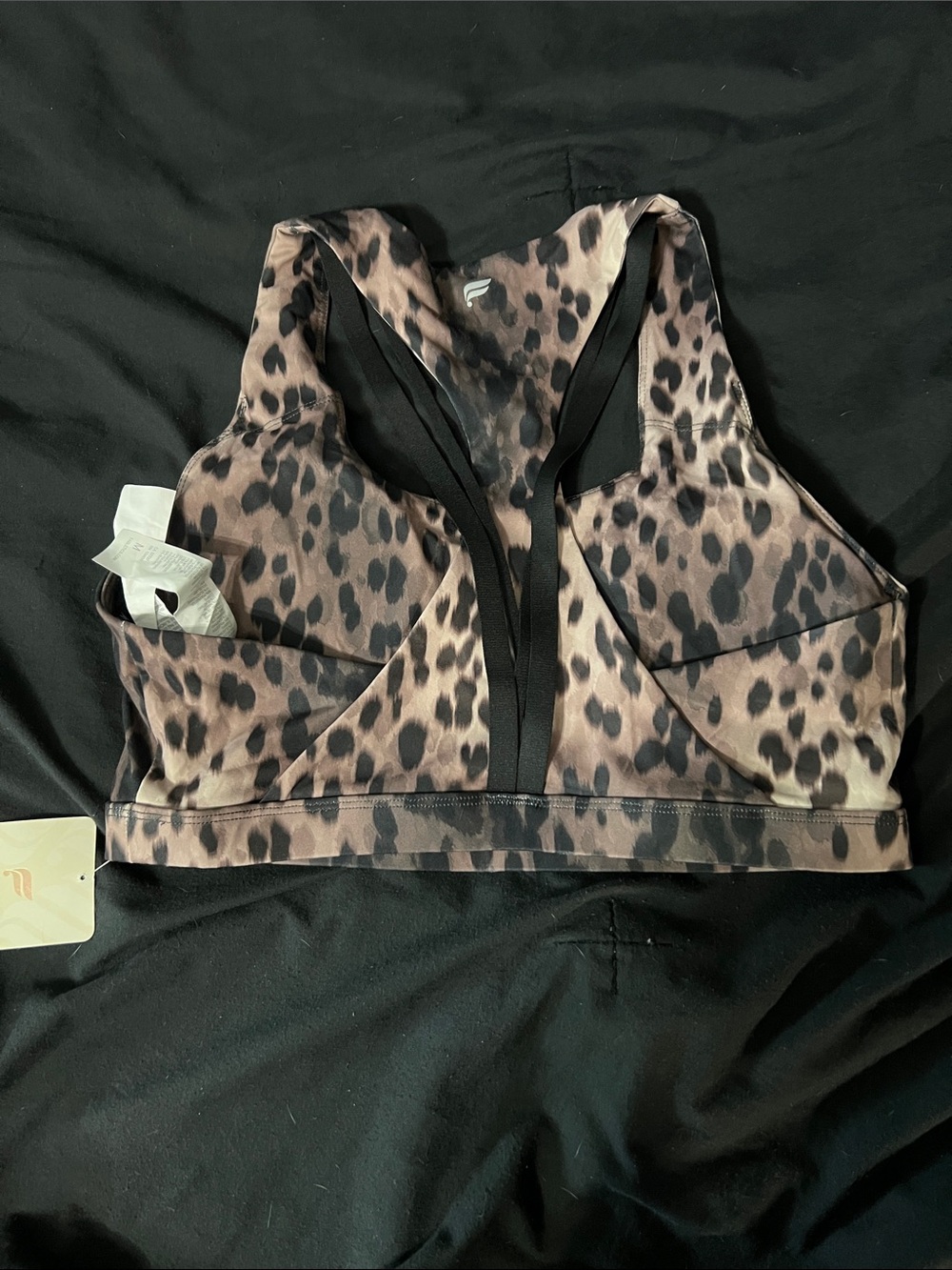 Fabletics Leopard-Print Sports Bra in Brown and Black
